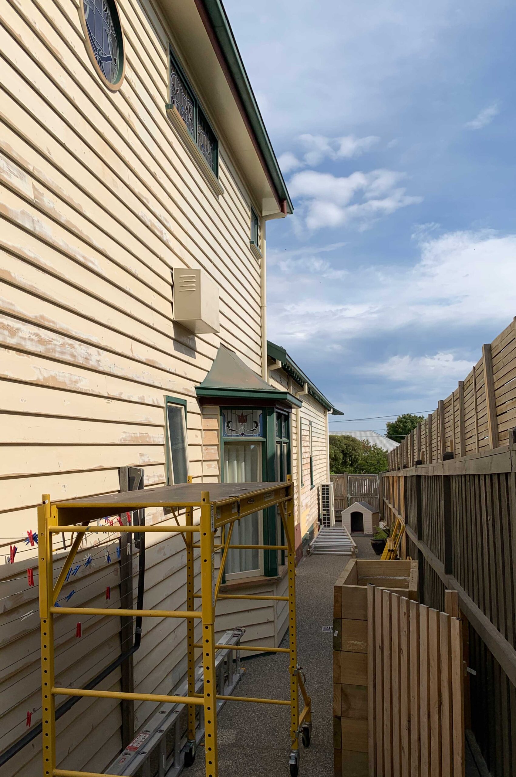 Graeber and Co. Painting exterior painting before completion 
